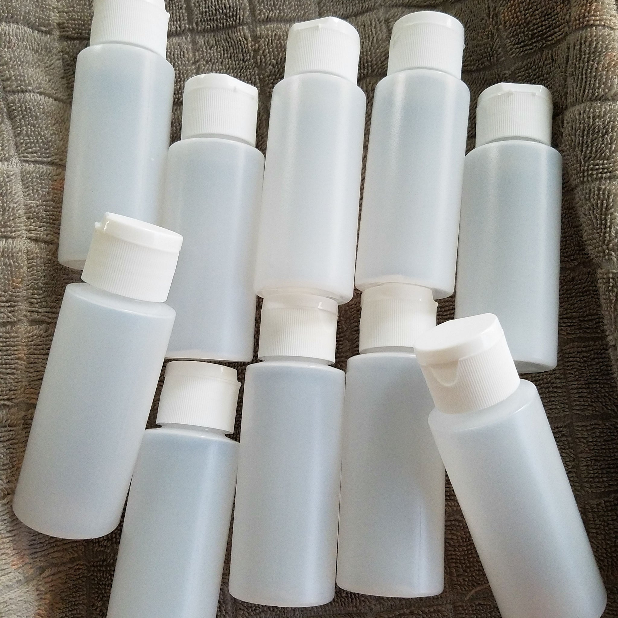 kelkaa 1oz HDPE Plastic Squeeze Bottles with White Flip Caps (Pack of